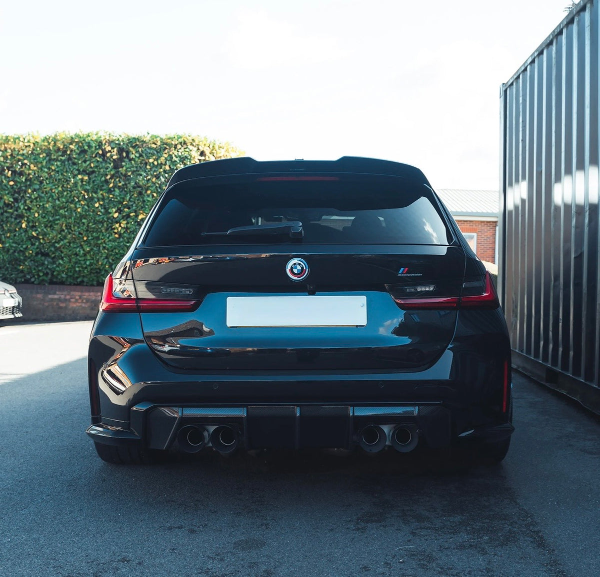     BMW M3 G81 Touring mit CPG+ V7 Carbon Dachspoiler Heckansicht