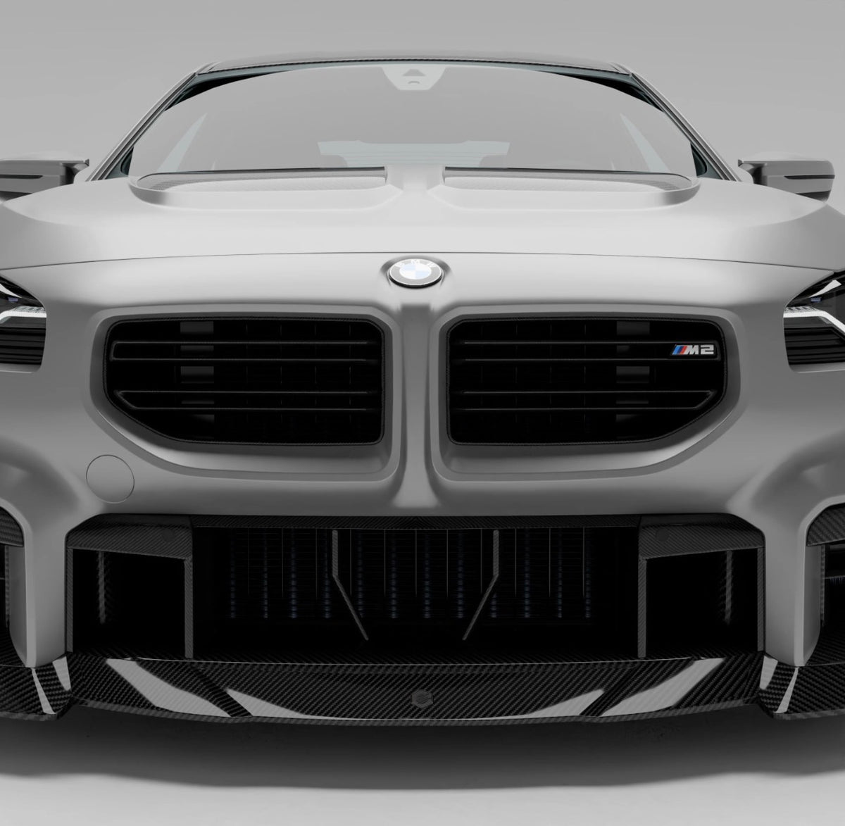 BMW M2 G87 in Weiß mit CPG + RV V1 Dry-Carbon Frontgrill in vollständiger Frontansicht.